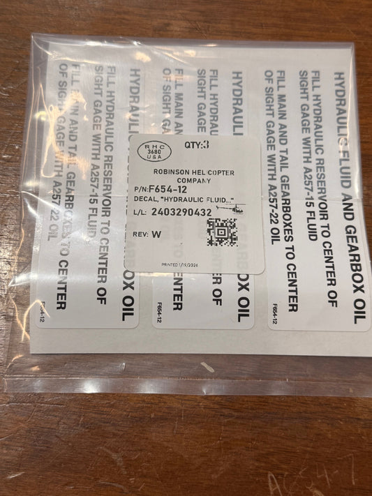 F654-12 DECAL, "HYDRAULIC FLUID"